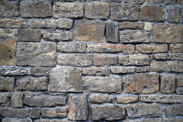 Texture wall of stones of various shapes