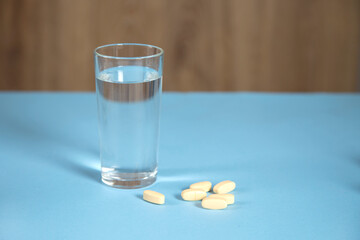 glass of water with drugs