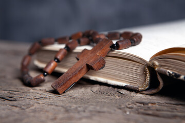 open book and cross on the table