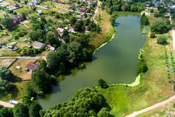 Pond in the village of Lyubitsy, Zhukovsky district, Kaluzhskiy region, Russia. Aerial view of the...