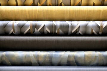 Rolls of vinyl wallpaper for finishing walls. Decorative  materials for renovation of room, interior, design
 Wallpapers with abstract patterns for the wall. Different textures, colors, background
