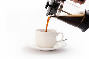 Coffee maker on a white background with a mug