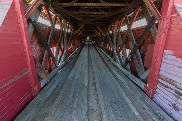 Interior view of an old long covered bridge