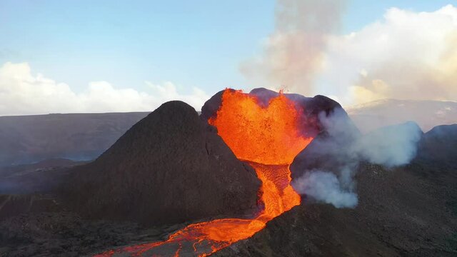 Amazing drone aerial of the dramatic volcanic eruption of the Fagradalsfjall volcano on the Reykjanes Peninsula in Iceland.