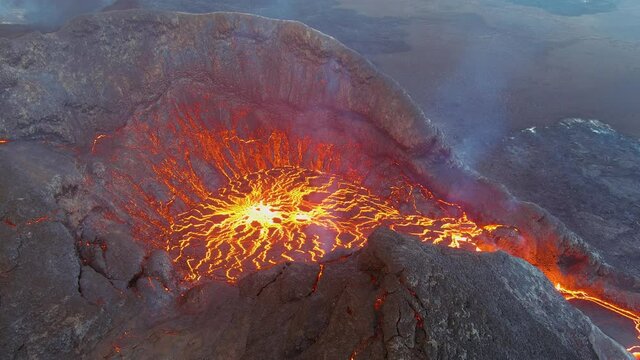 Amazing night drone aerial of the dramatic volcanic eruption of the Fagradalsfjall volcano on the Reykjanes Peninsula in Iceland.
