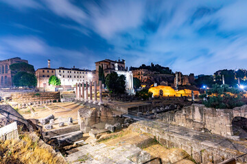 night view of the roman forum with archaeolocial site in Rome