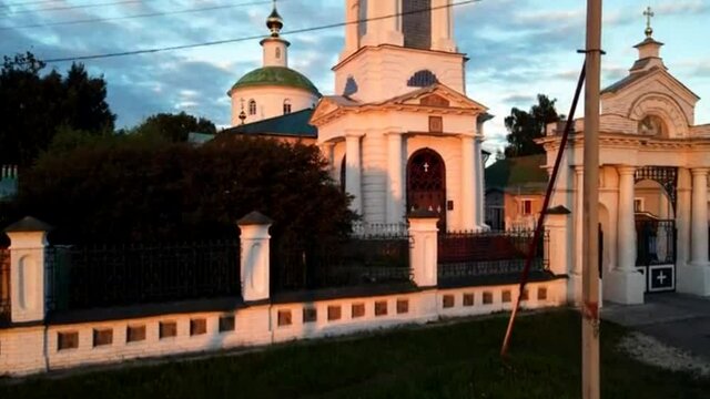 Beautiful evening view of the Orthodox church in the sunset. Shooting from a drone.