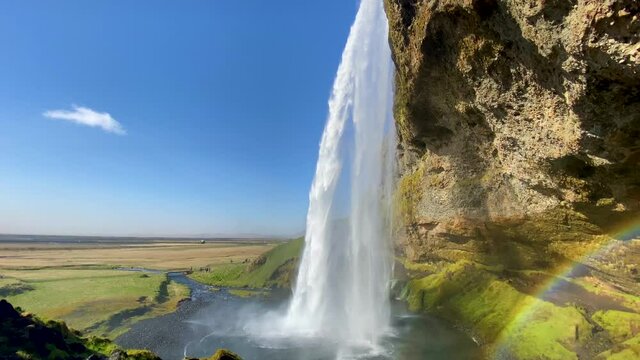 Establishing shot of the beautiful Seljalandsfoss waterfall in South Iceland.