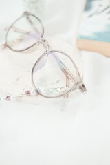Close up eye glasses on white background minimalism
