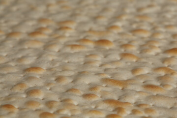 Traditional Jewish matzah for Passover close-up. background