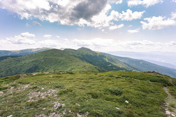 extraordinary mountains that are close to the sky. landscapes in the mountains. summer vacation and camping with tents