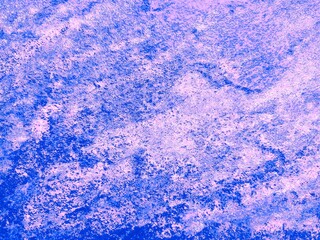 Pink, lilac, blue stone texture. Stone surface. Marble, granite. Contrasting texture. Black, blue, pink colors. Abstract artistic background.
