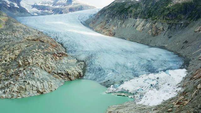 Switzerland, canton of Valais. Aerial view of the Rhone Glacier (Rhonegletscher) on a cloudy day 