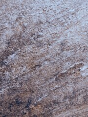 Stone surface. Marble, granite. Contrasting texture. Black, blue, pink colors. Abstract artistic background.