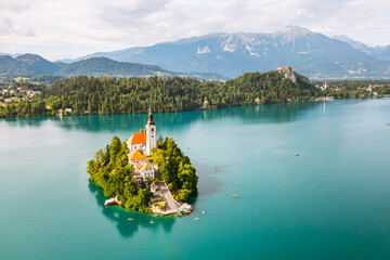 Panoramic view of Lake Bled with Assumption of Maria Church on island on the background of Julian...