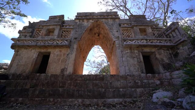2021 - The sun shines through an arch in a Mayan temple in Labna, Mexico.