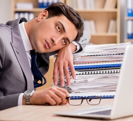 Businessman tired sitting in the office