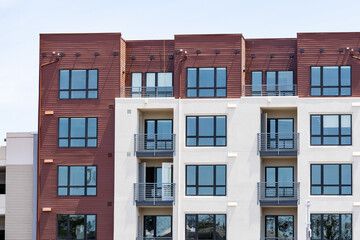 Exterior view of modern apartment building offering luxury rental units in Silicon Valley; Sunnyvale, San Francisco bay area, California