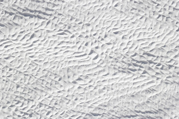 Abstract texture of gray-white calcium deposit on surface stone. Pamukkale travertine surface in Turkey