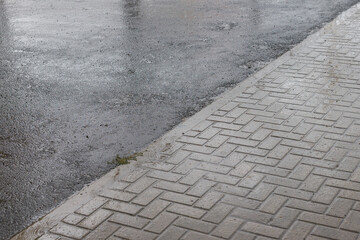Fototapeta premium wet tile and road. weather
