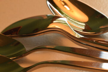 Macro of reflective spoons