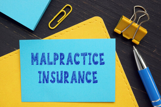 Business concept about MALPRACTICE INSURANCE with phrase on the business paper