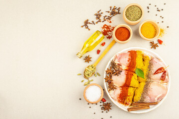 Chicken and curry spices. Set of raw ingredients for cooking traditional food
