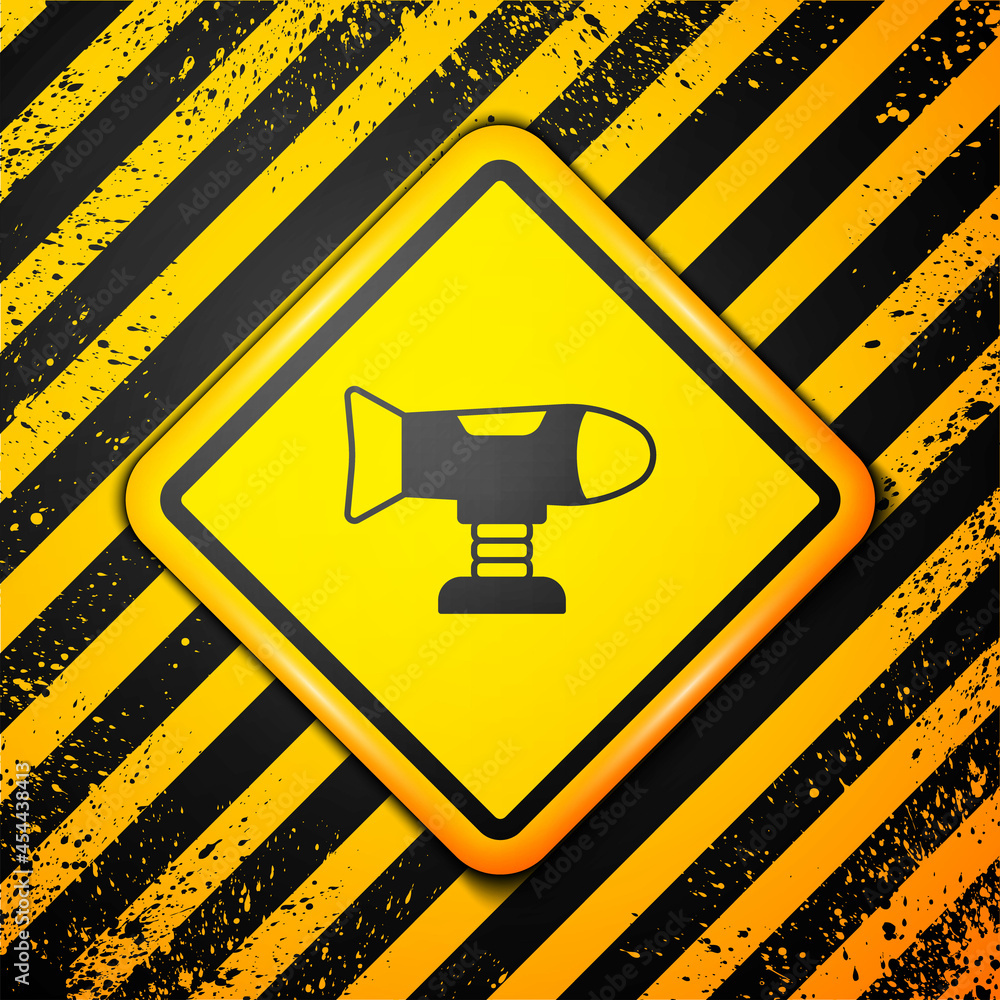 Poster black swing plane on the playground icon isolated on yellow background. childrens carousel with plan