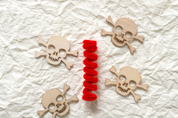 halloween themed wooden shapes arranged on crumpled ivory paper background