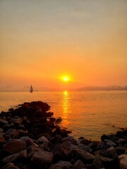 The sunset and the sailboat!