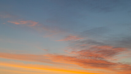 Naklejka na ściany i meble A beautiful sunrise with blue and orange tone.