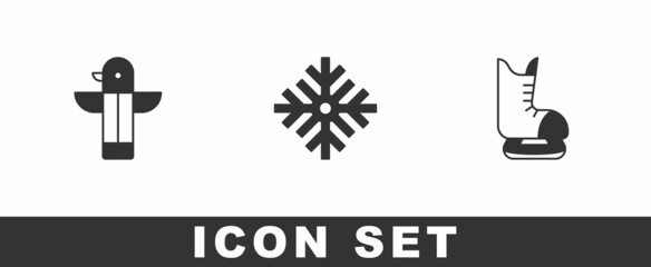 Set Canadian totem pole, Snowflake and Skates icon. Vector
