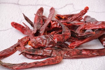 Dried red chilli on white background