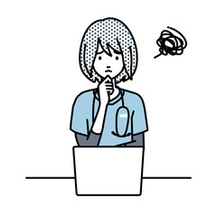 デスクで座ってPCを開いて困っている看護師の女性