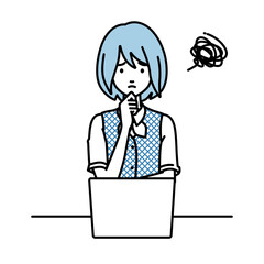 デスクで座ってPCを開いて困っている事務員制服の女性