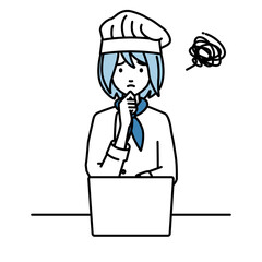 デスクで座ってPCを開いて困っている調理師の女性