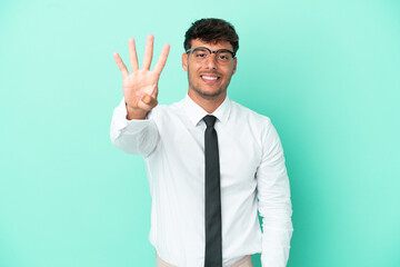 Business caucasian man isolated on blue background happy and counting four with fingers