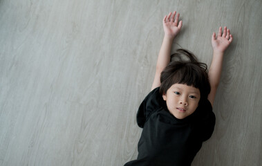 A lovely girl sleeping on the floor, happy kid sleep, portrait asian child, stay at home
