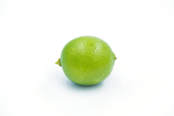green lemons on white background
