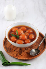 Bubur Biji Salak (Candil) is Indonesian Famous Dessert during Ramadan Breakfasting. Made from Sweet Potato or Yellow Pumpkin Kabocha Balls with Palm Sugar Syrup and Coconut Milk.
