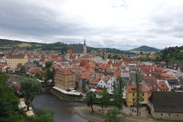 Fototapeta na wymiar Town view with red roofs and vltava river during summer in Český Krumlov (Cesky Krumlov), a town in the South Bohemian Region, Czech Republic, a UNESCO World Heritage Site, Gothic, Renaissance, Baroq