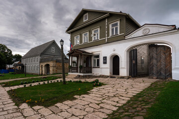 View of historical merchant buildings of estates on the main street of Izborsk Pechorskaya Street...