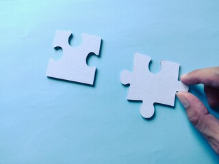 Fototapeta premium hand with puzzle
