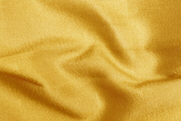 Gold brown fabric with soft texture background