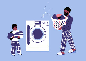 dad doing laundry with child. father fills washing machine with dirty cloths. man with launder basket doing household tasks. cleaning and chores.