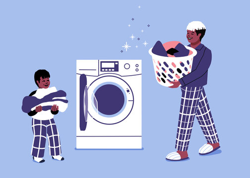 dad doing laundry with child. father fills washing machine with dirty cloths. man with launder basket doing household tasks. cleaning and chores.