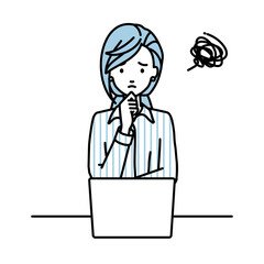 デスクで座ってPCを開いて困っているブラウスの女性
