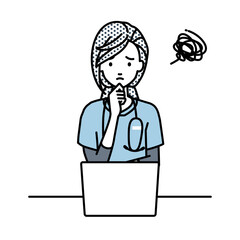 デスクで座ってPCを開いて困っている看護師の女性