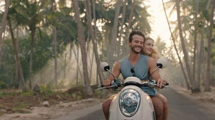 travel couple riding scooter on tropical island enjoying romantic ride exploring beautiful travel destination on motorcycle adventure