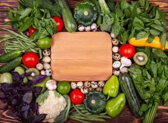 Various fresh vegetables ingredients. Conceptual vegan food, healthy eating. Flay lay fresh uncooked vegan food still life. Healthy clean eating layout, vegetarian food and diet nutrition concept.